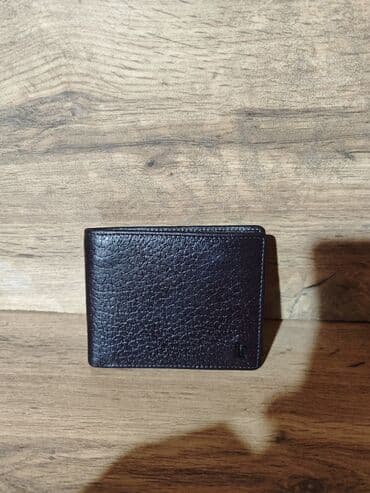 найден кошелек: Портмоне 
Натуральная кожа — 1