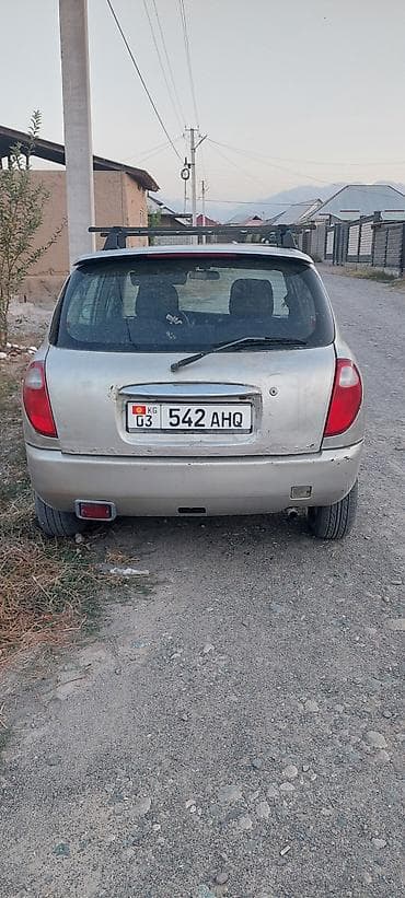 чехлы бу: Daihatsu Sirion: 2000 г., 1.1 л, Механика, Бензин, Хэтчбэк — 4