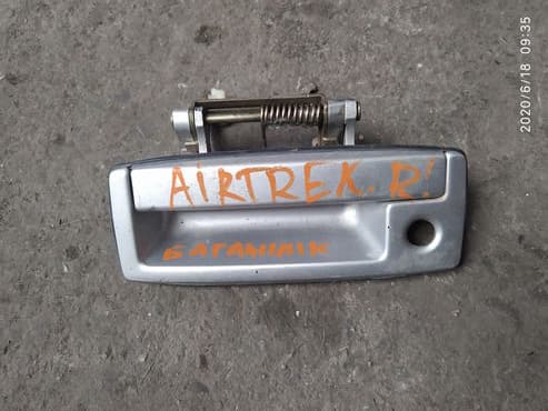 шредеры продольный с ручкой: Mitsubishi Airtrek/Outlander ручка от багажника, Митцубиси — 1