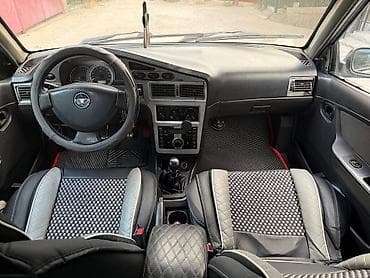 devo matiz: Daewoo Nexia: 2012 г., Седан — 7
