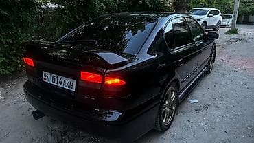 гоночный костюм: Subaru Legacy: 2000 г., 2 л, Автомат, Бензин, Седан — 2
