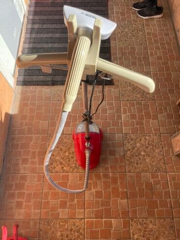 фен с вращающейся щеткой: Отпариватель Philips, Вертикальный — 4