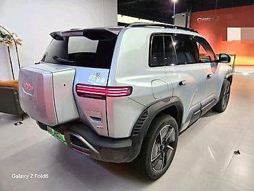 wuling mini ev: Электрический кроссовер (5 дверей, 5 мест) в светло‑сером цвете с — 4
