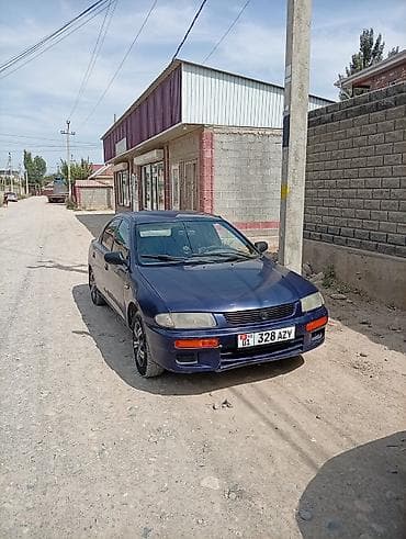 Mazda 323: 1995 г., 1.5 л, Механика, Бензин, Седан