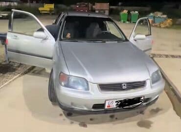 дом в колесах: Honda Civic Описание:Honda Civic - Кузов: серебристый седан/хэтчбек — 1