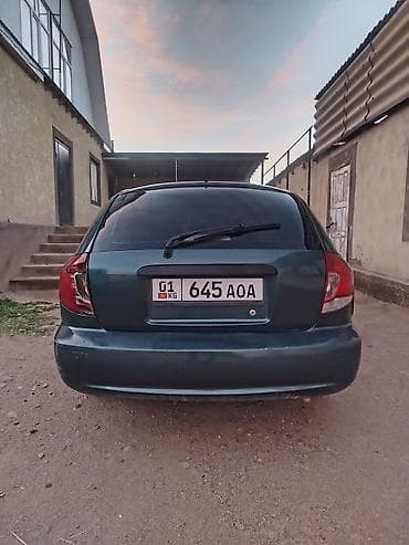 golf 3: Kia Rio: 2004 г., 1.5 л, Механика, Бензин, Универсал — 4