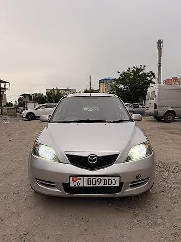 нексе: Mazda Demio: 2003 г., 1.3 л, Автомат, Бензин, Лифтбек — 1