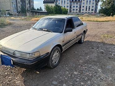 салон машины: Mazda 626: 1988 г., 2 л, Механика, Бензин, Седан — 6