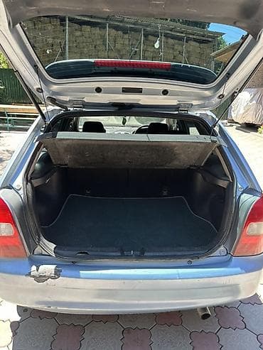 атего 1229: Mazda Familia: 1998 г., 1.8 л, Автомат, Бензин, Универсал — 7