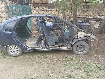 широкий выбор: Запчасти на Рено Меган Сценик (универсал), тёмно‑синий цвет. В — 7