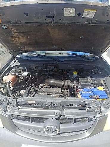 химия авто: Mazda Tribute: 2001 г., 2 л, Механика, Бензин, Кроссовер — 1