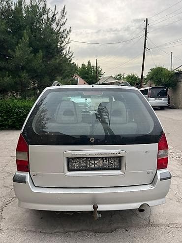 купить машину changan: Mitsubishi Grandis: 1999 г., Механика, Бензин, Минивэн — 5