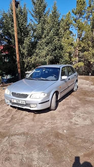 мазда 621: Mazda 323: 1999 г., Автомат, Универсал — 4