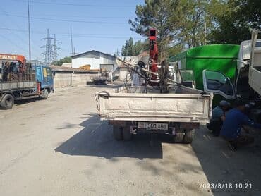 купить грузовой автомобиль с манипулятором бу: Манипулятор, Nissan, 1986 г. — 2