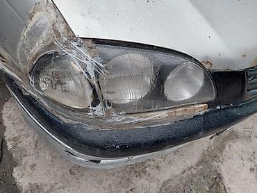 Автокосметика: Фары целые, просто скоч нужно убрать, от тайота авенсис 1998 года — 2