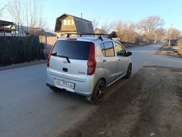 купить авто в кредит без первоначального взноса: Daihatsu Cuore: 2009 г., 1 л, Механика, Бензиновая, Хэтчбэк — 3