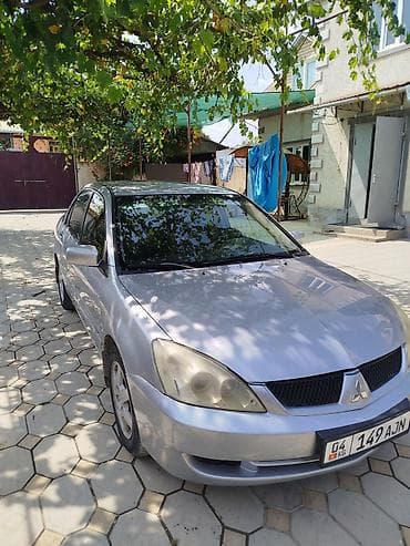 чери арризо 8 салон: Mitsubishi Lancer: 2006 г., Седан — 4