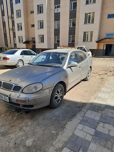 nissan skyline: Daewoo Leganza: 1997 г., Седан — 4