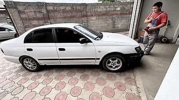 Toyota Carina E: 1996 г., 1.6 л, Механика, Бензин, Седан at lalafo.kg Toyota Carina E: 1996 г., 1.6 л, Механика, Бензин, Седан