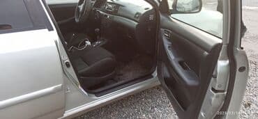 дверные обшивки гольф 2: Toyota Corolla: 2004 г., Автомат, Бензин, Седан — 7