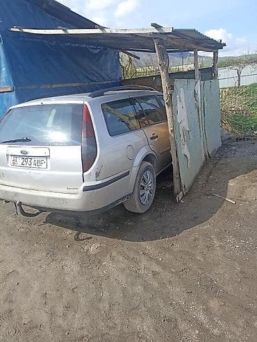 пороги мазда демио: Ford Mondeo: 2002 г., Универсал — 5