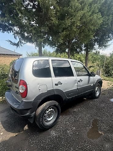 Продажа авто: Chevrolet Niva: 2011 г., 1.7 л, Механика, Бензин, Кроссовер — 4