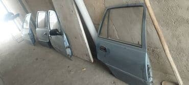 Кузовные детали: Дверь Комплект Daewoo, Оригинал — 1