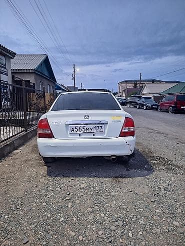 stepwgn rg: Mazda Familia: 2002 г., Бензин, Седан — 4