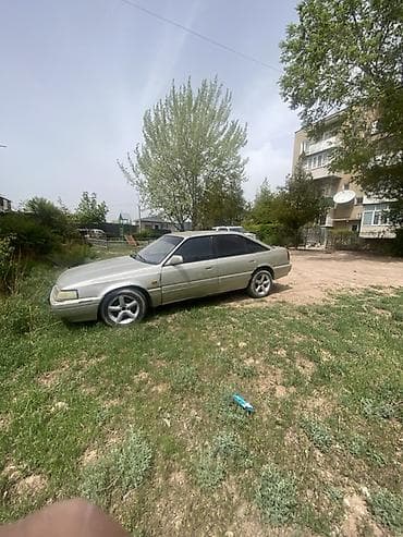 Транспорт: Mazda 626: 1991 г., 2 л, Механика, Бензин, Лифтбек — 3