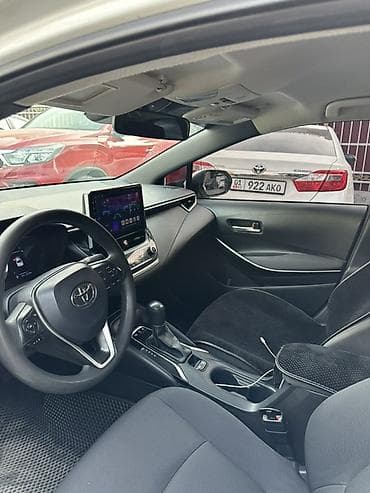 byd e2 2023: Toyota Corolla: 2019 г., 1.8 л, Вариатор, Гибрид, Седан — 4