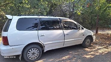 додже караван: Honda Odyssey: 1998 г., 2.3 л, Автомат, Бензин, Минивэн — 1