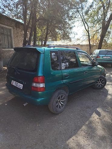 Транспорт: Mazda Demio: 1999 г., 1.3 л, Механика, Бензин, Хэтчбэк — 4