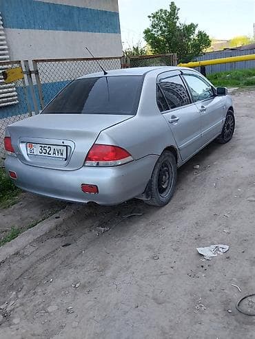 Mitsubishi Lancer: 2004 г., 1.6 л, Механика, Бензин, Седан