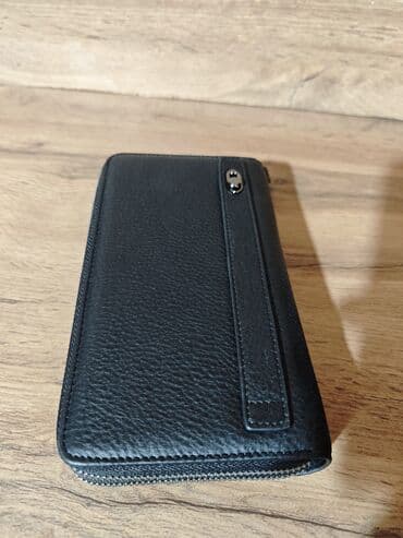 найден кошелек: Портмоне клатч 
Натуральная кожа — 2