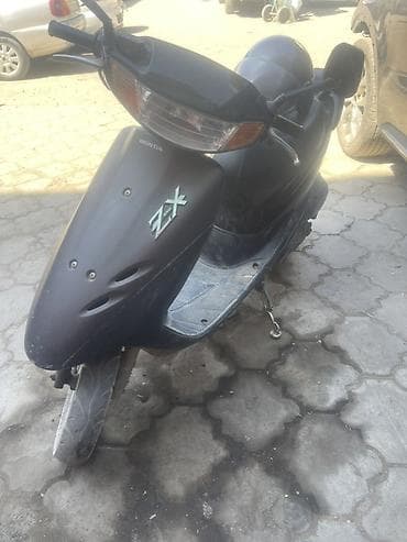 Продаю Скутер Honda ZX (Dio ZX), Очень резвая! Черный цвет. Состояние at lalafo.kg Продаю Скутер Honda ZX (Dio ZX), Очень резвая! Черный цвет. Состояние