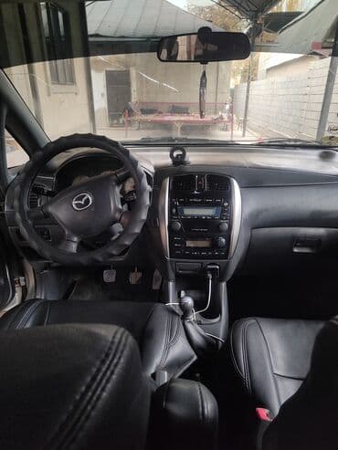 меняю дом на авто: Mazda PREMACY: 2003 г., 2 л, Механика, Дизель, Минивэн — 4