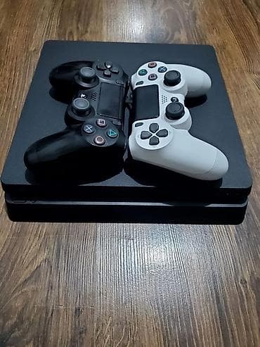 PS5 (Sony PlayStation 5): PlayStation 4 Slim (черная, ) привезена из дубаев была создана в Дубае — 2