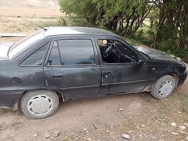 Унаа сатуу: Daewoo Nexia: 2012 г., 1.6 л, Кол менен иштөөчү, Бензин, Седан — 4