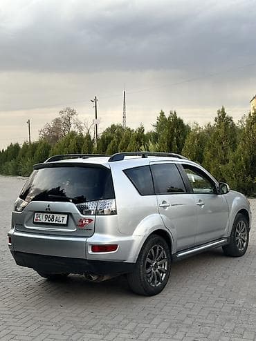 wheel: Mitsubishi Outlander: 2011 г., Автомат, Бензин, Кроссовер — 6