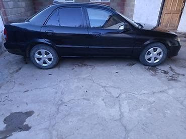 мазда крыло: Mazda Familia: 2001 г., Бензин, Седан — 3