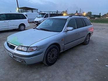626: Mazda 626: 1998 г., 1.8 л, Ручные, Бензин, Универсал — 4