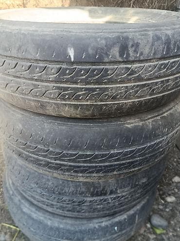 оптом шины: Комплект автомобильных шин 175/70 R13 82T. Характеристики: - Размер — 2