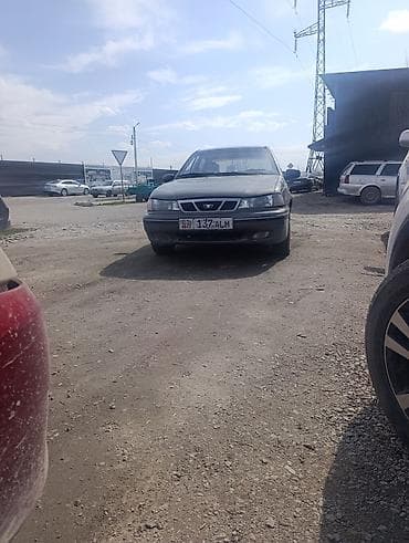 Mazda: Daewoo Nexia: 2003 г., Механика, Бензин, Седан — 2