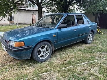gac aion y: Mazda 323: 1990 г., Механика, Бензин, Седан — 2