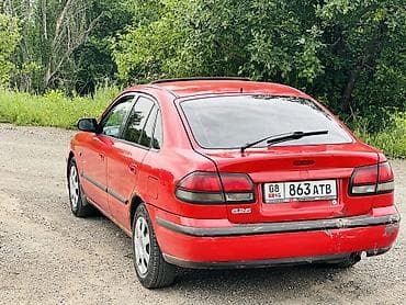 2 8: Mazda 626: 1998 г., 2 л, Механика, Бензин, Седан — 7