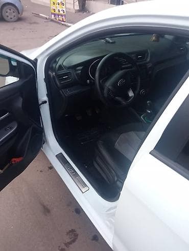 кызыл октябрь: Kia Rio: 2013 г., 1.4 л, Механика, Бензин, Седан — 6