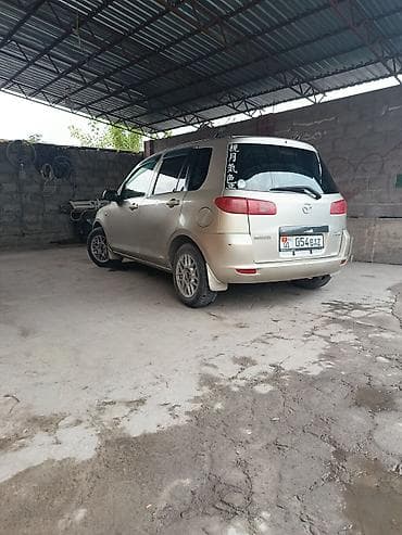 Транспорт: Mazda Demio: 2003 г., Бензин, Хэтчбэк — 7