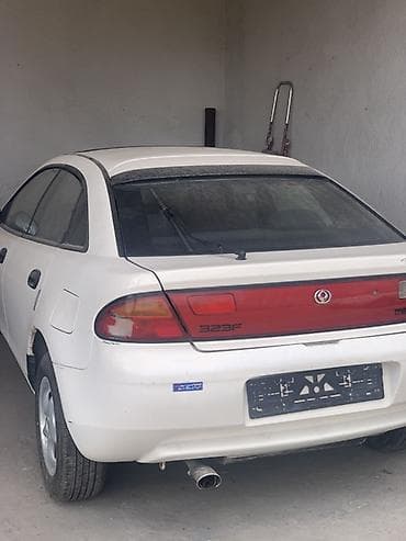 mazda 3: Mazda 323: 1996 г., 1.8 л, Автомат, Бензин, Лифтбек — 1