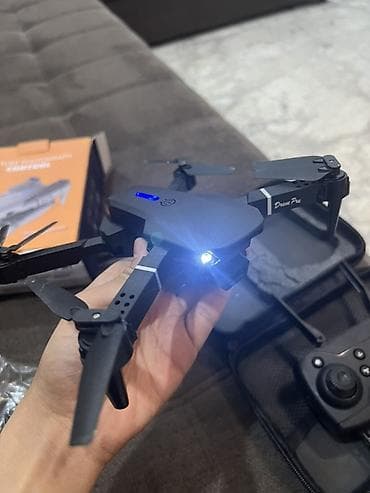 Фото жана видеокамералар: Складной квадрокоптер Drone Pro с подсветкой и пультом ДУ — 1