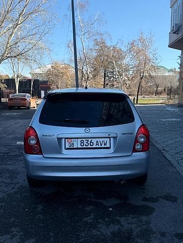 приора автомат: Mazda 323: 2003 г., 1.6 л, Автомат, Бензин, Хэтчбэк — 5